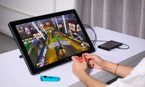 a person gaming on Huion Kamvas RDS 220 Pen Display